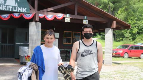 Camper and counselor getting ready to swim