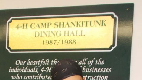 camp worker dressed as a pirate poses for the camera 