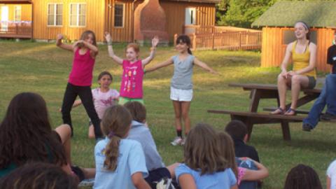 Youth perform a skit. 