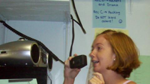 Staff making an announcement in office.