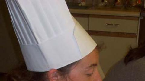 Staff pretending to eat their whole parfait cup in one bite.