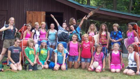 Back packing youth pose for a photo. 