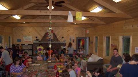 Campers working on craft projects. 