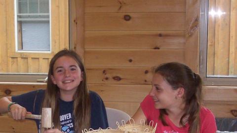 Youth working on weaving projects. 