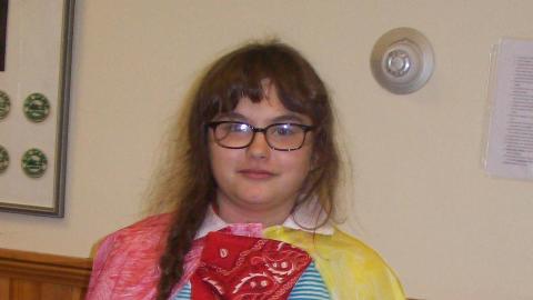 Camper wearing a wizard costume as part of Wizard Week. 