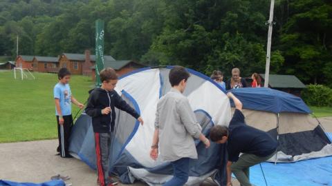 Youth set-up tents to be used for backpacking class. 