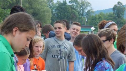 Campers and counselors in line for sandwiches. 