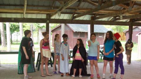 Youth performing a skit as part of the drama class. 