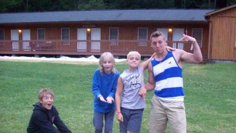 Campers show their excited faces after playing a game of ring toss. 
