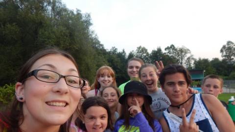 A group of youth taking a selfie. 