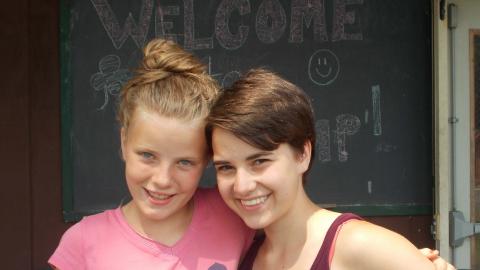 campers posing for photo with smiles on faces 